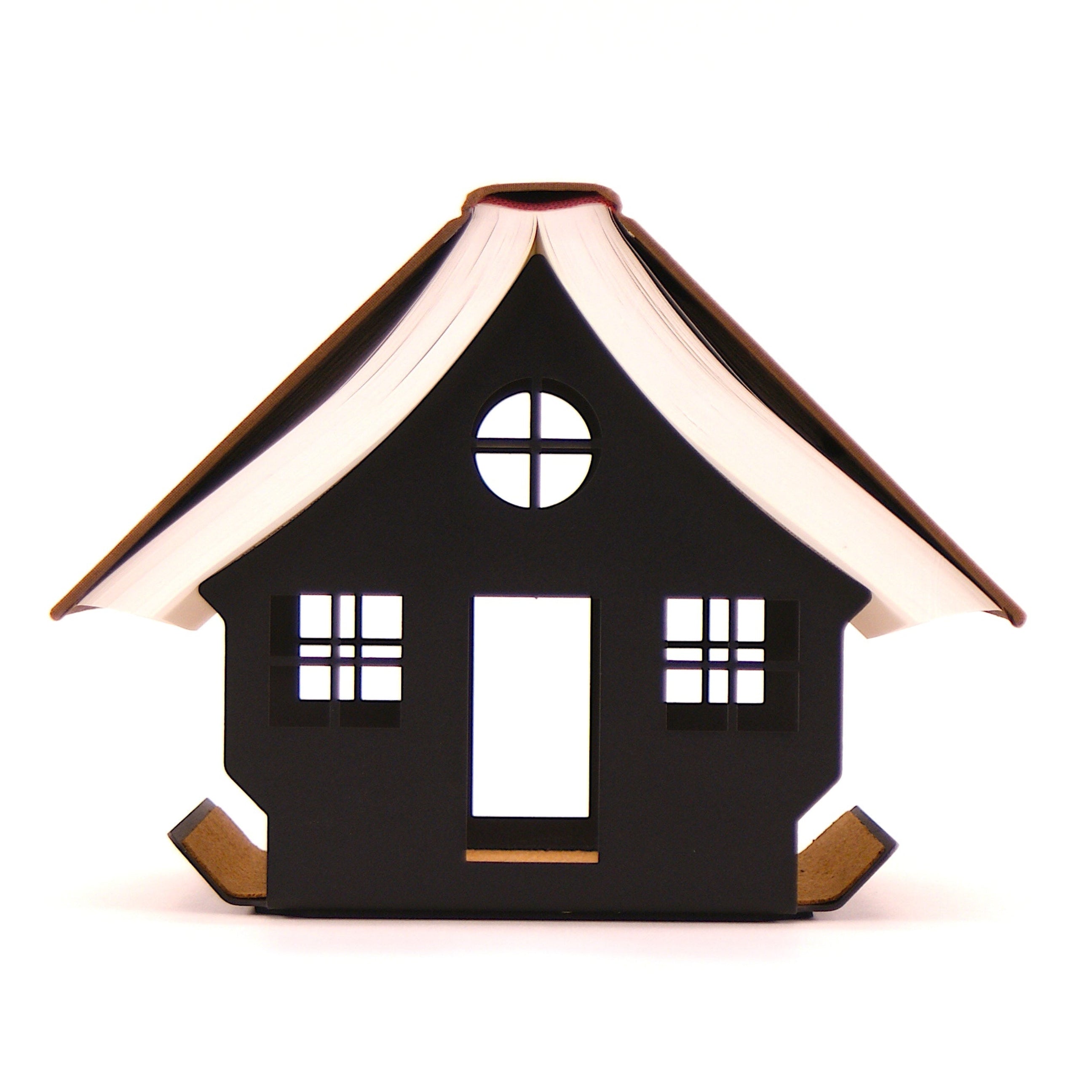 Book on a ouse shaped book rest seen from the front. Shows the curvature of the pages. All on a white background.