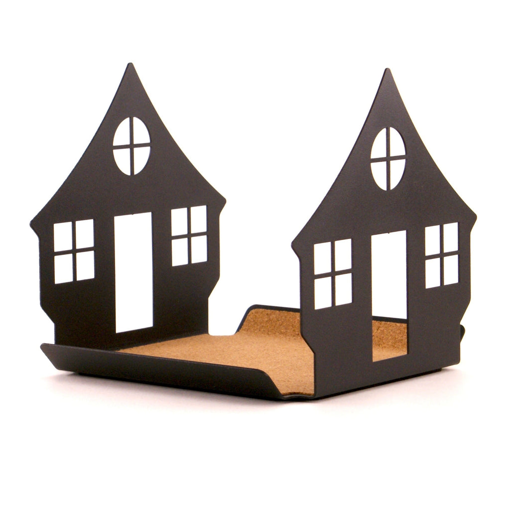 Black house-shaped book rest on a white background.
