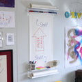 Mounted on wall with writing on