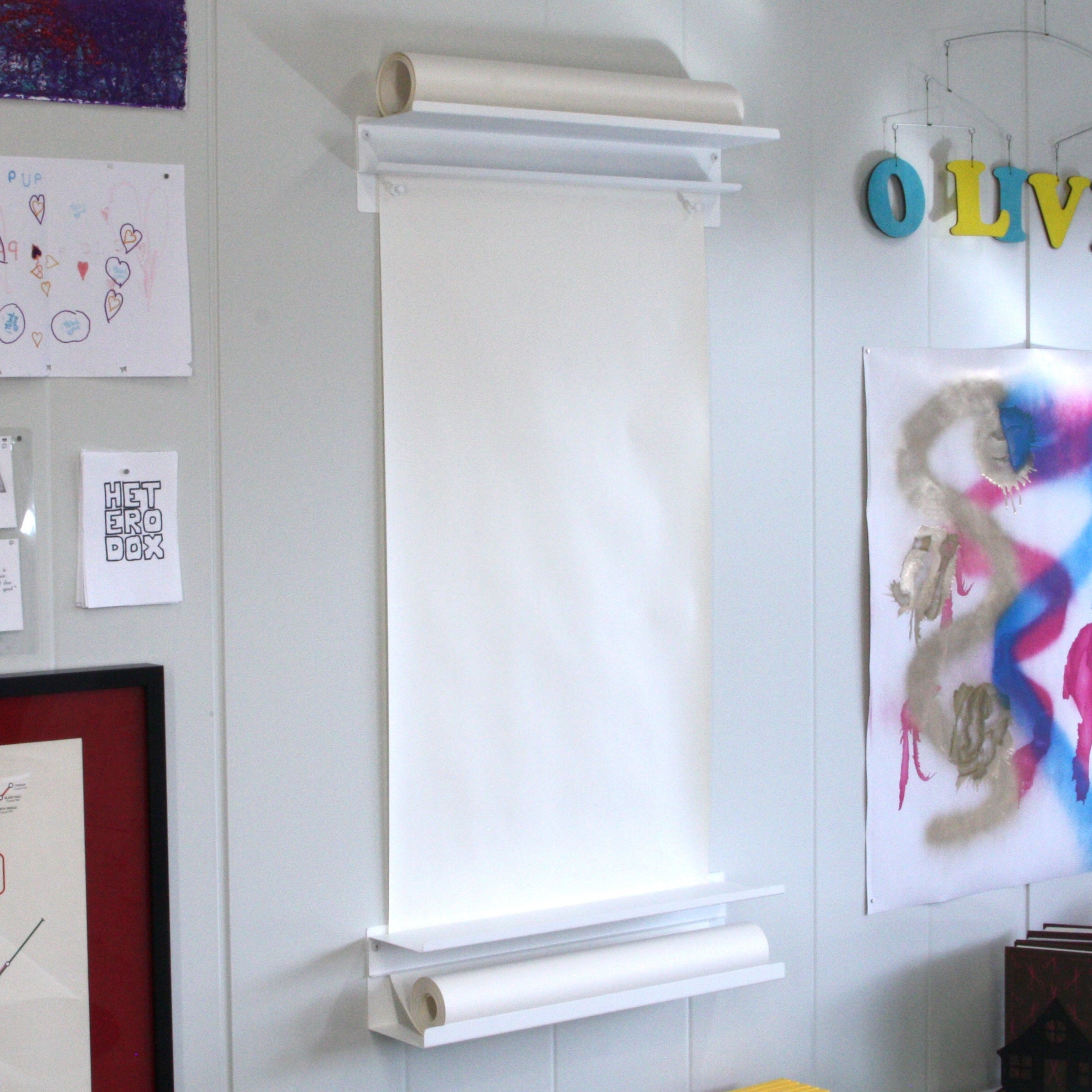 Mounted on wall, completely clean - no writing, not objects on shelves.